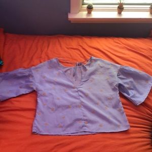 Blue and white top with yellow flowers